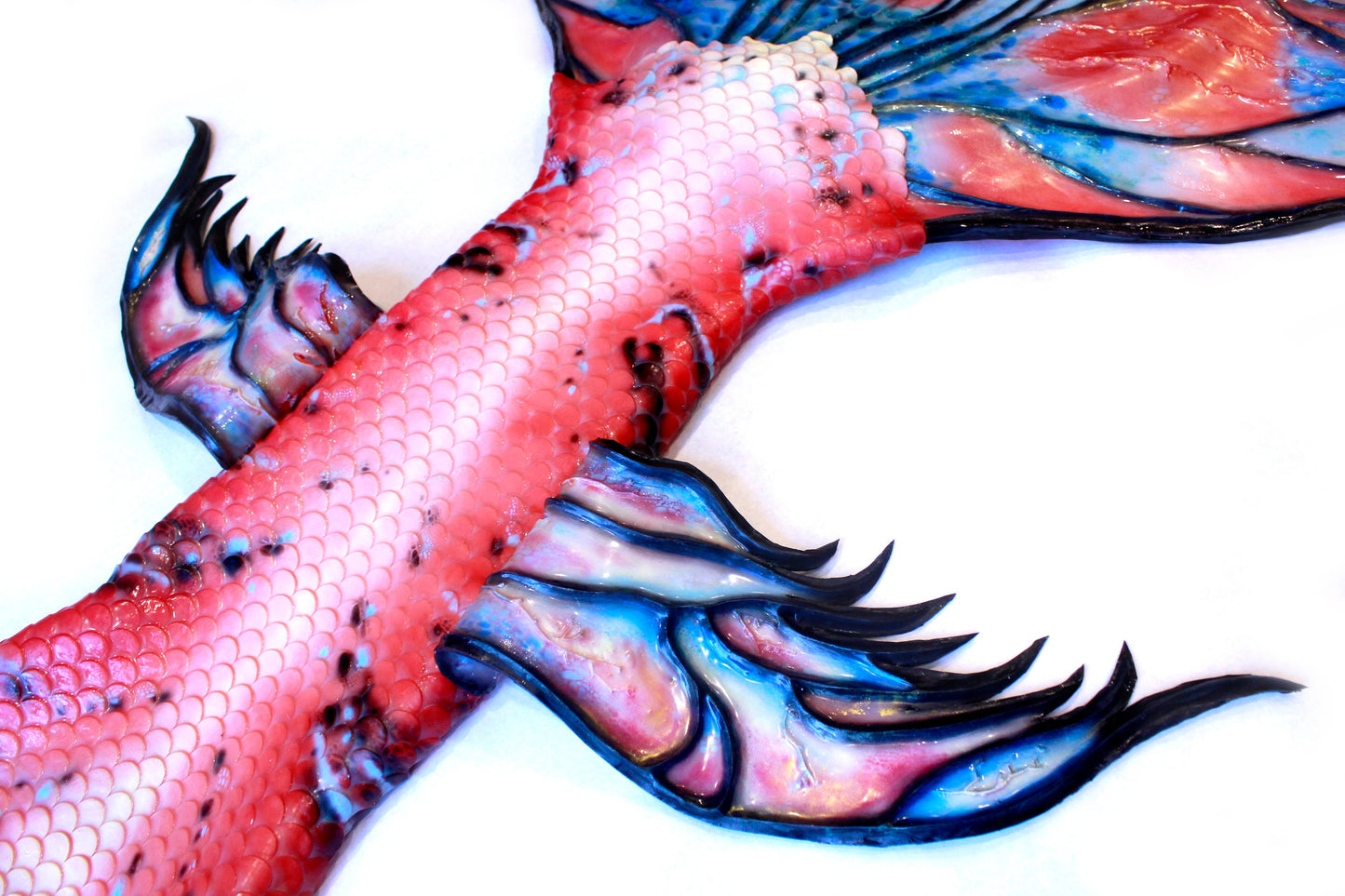 Professional mermaid tail, completely in silicone (dragon skin), with monofin inside.
