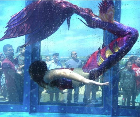 Mermaid tail completely in silicone (dragon skin, skin safe grade), abstract color, simple patterns in molds (no airbrush)