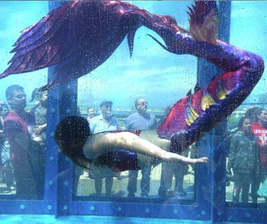 Mermaid tail completely in silicone (dragon skin, skin safe grade), abstract color, simple patterns in molds (no airbrush)